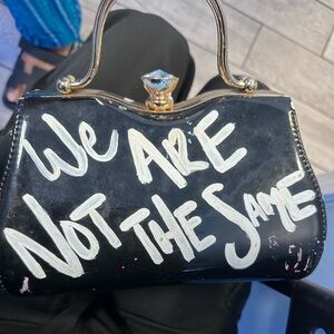 We Are Not The Same Purse